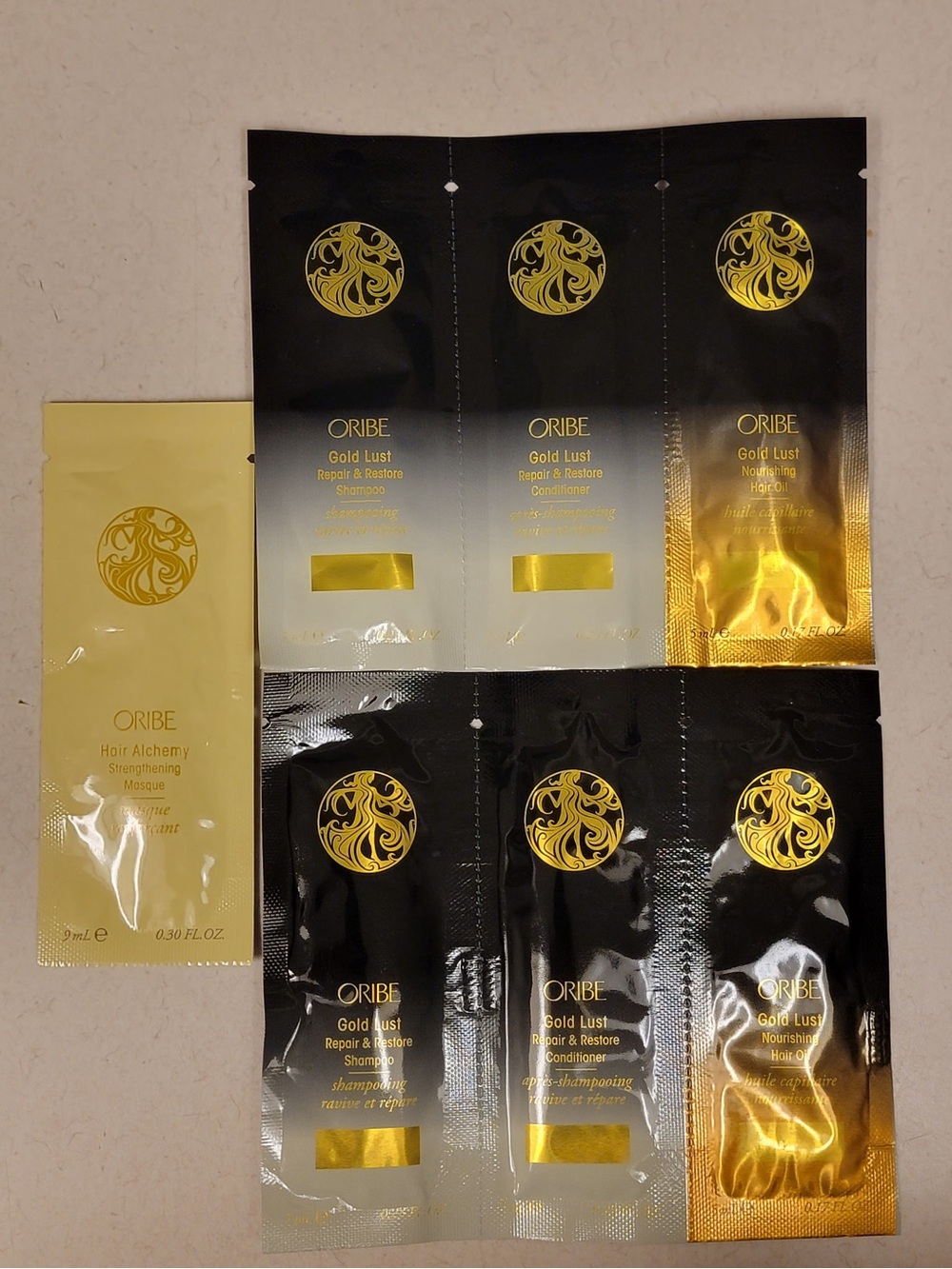 Oribe Gold Lust Sample Sachet Trio Pack - Set of 2 + Hair Alchemy Masque Sachet